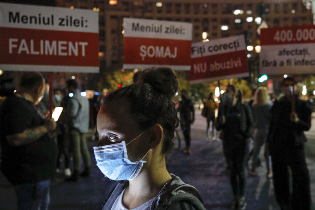 APTOPIX Virus Outbreak Romania Protest